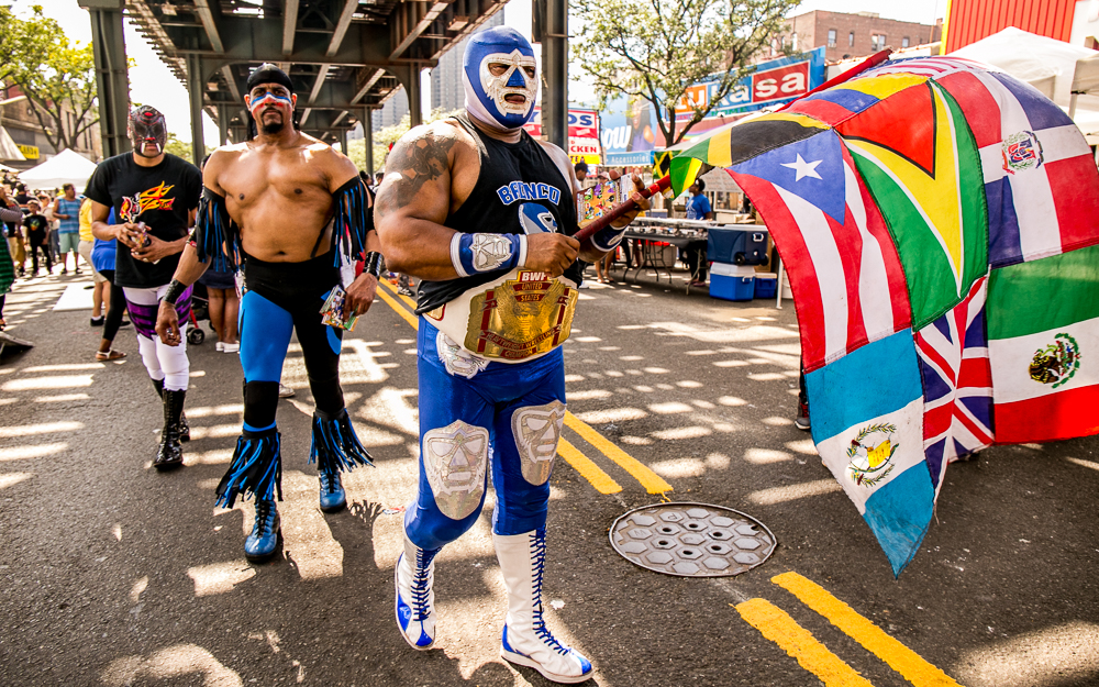 A SURPRISE APPEARANCE by the Bronx Wrestling Federation add some colorful flair to the fall festival. They're led by Bronco International, who also founded the organization. 