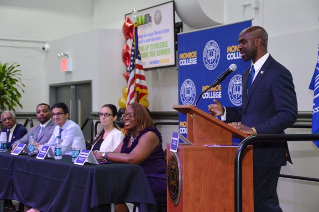 ASSEMBLYMAN MICHAEL BLAKE of the 79th Assembly District, delivers the keynote address.  Photo courtesy Monroe College