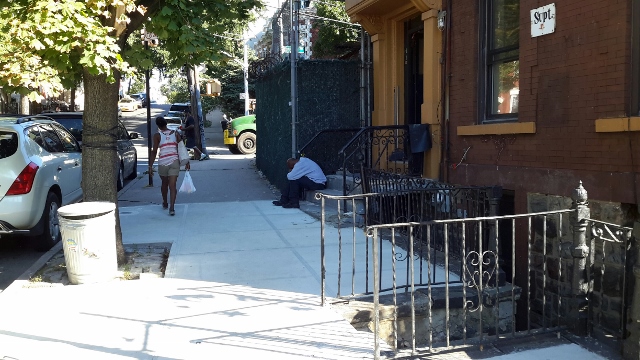 RESIDENTS ARE OUTRAGED over converting this building (right) into a shelter.  Photo by Tatyana Turner