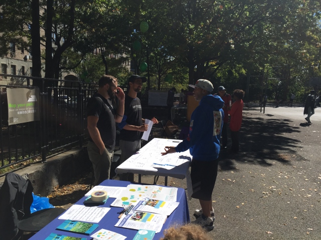 THIS NEIGHBOR (RIGHT) chats with two representatives from Partnership for Parks on hand at an interactive visioning session at Kossuth Playground.  Photo courtesy Friends of Mosholu Parkland