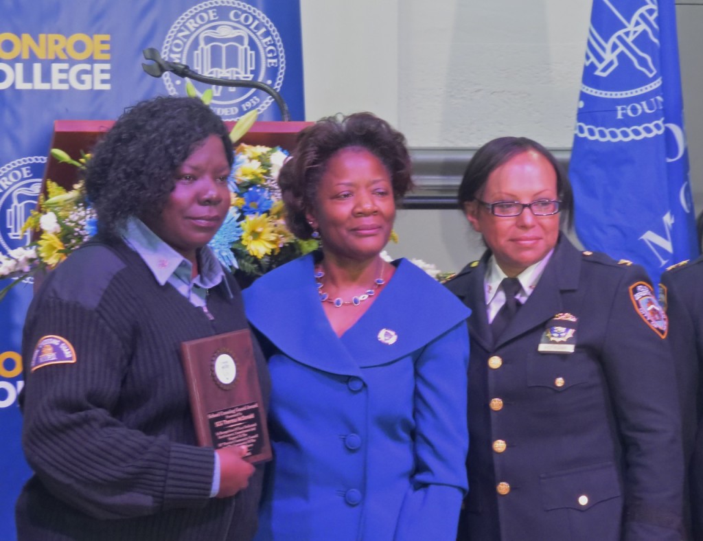 Over 20 Honored at 52nd Precinct Council Breakfast (Caption 2) - 10’3’15 FINAL jn SCHOOL CROSSING GUARD Theresa McDonald (left) smiles after receiving the School Crossing Guard Award. She stands with Brenda Caldwell-Paris, president of the 52nd Precinct Community Council and Inspector Nilda Hofmann, commanding officer of the 52nd Precinct.  Photo by Jasmine Gomez 