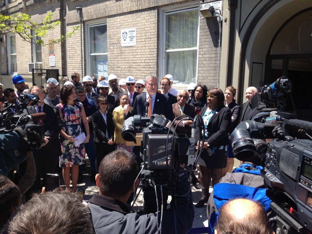 MAYOR BILL DE BLASIO, at a news conference in May 2014, announces his Housing New York plan in the Claremont Village of the Bronx. File Photo 