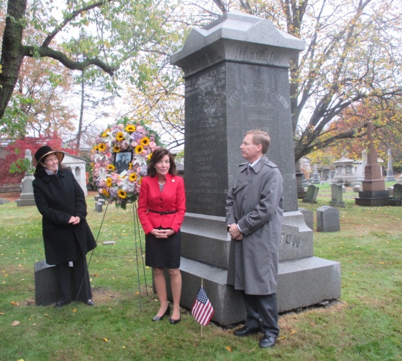 COLINE JENKINS (LEFT), the great great granddaughter of women's suffrage pioneer Elizabeth Cady Stanton, celebrates Stanton's 200th birthday alongside New York State Lieutenant Governor Kathy Hochul and Mitch Rose, president and CEO of Woodlawn Cemetery. Photo by Vivian Carter