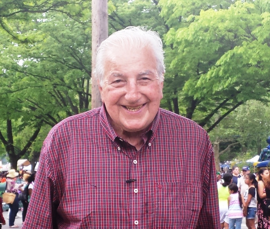 DOLPH SCHAYES GETS ready to talk to reporters after the Bronx Week Parade made its way up on Mosholu Parkway, near Schayes' alma mater, DeWitt Clinton HS. Photo by Vivian Carter